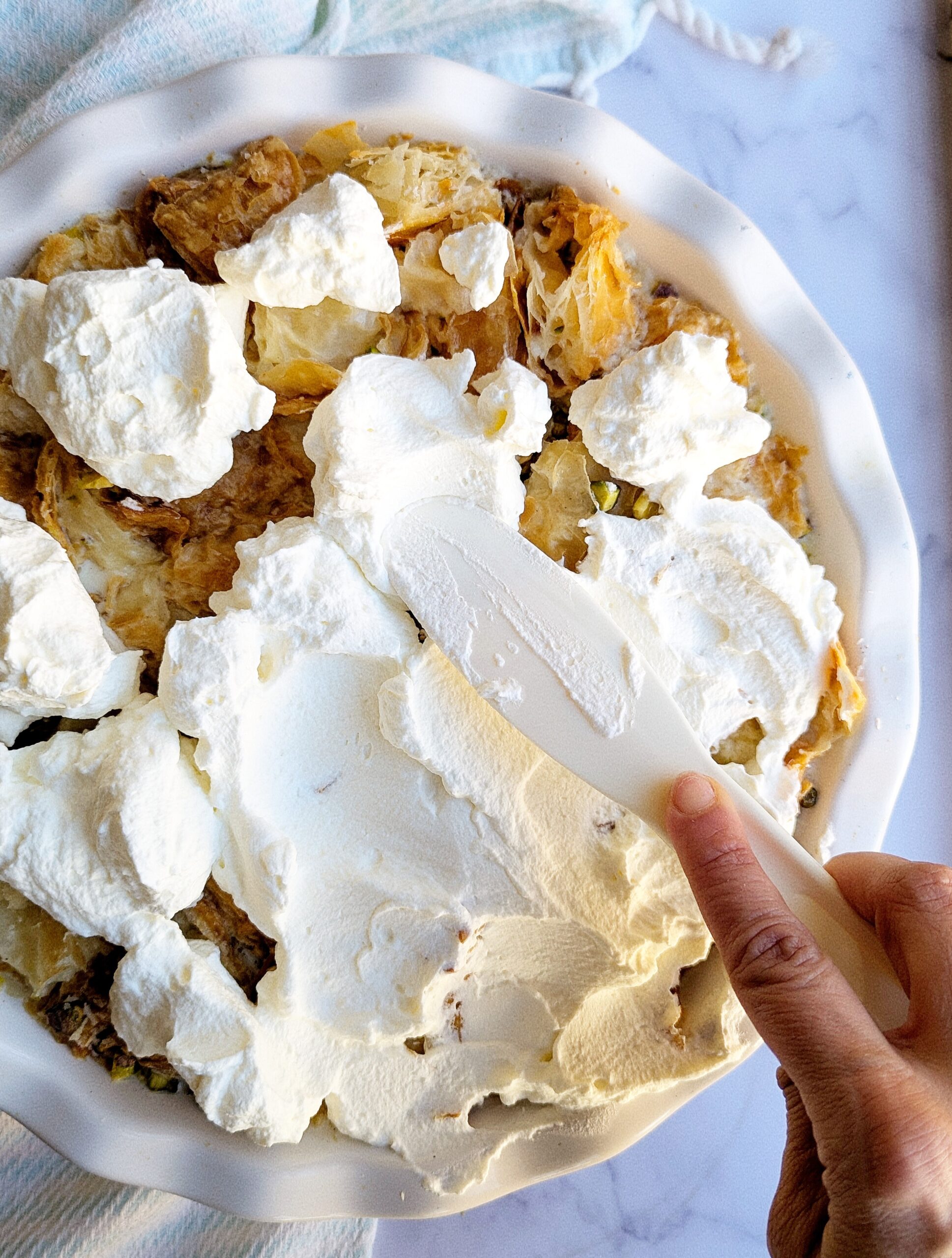 cover om ali in dollops of cream