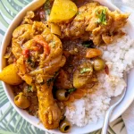 Pollo guisado with rice