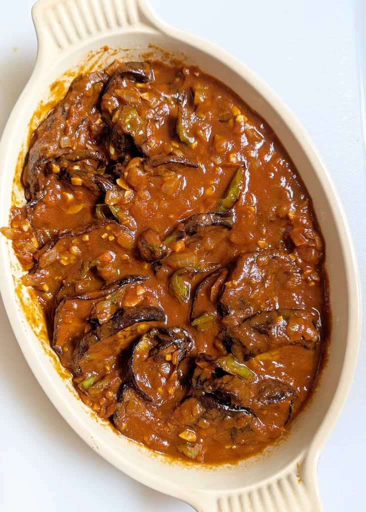 Pour sauce over eggplant