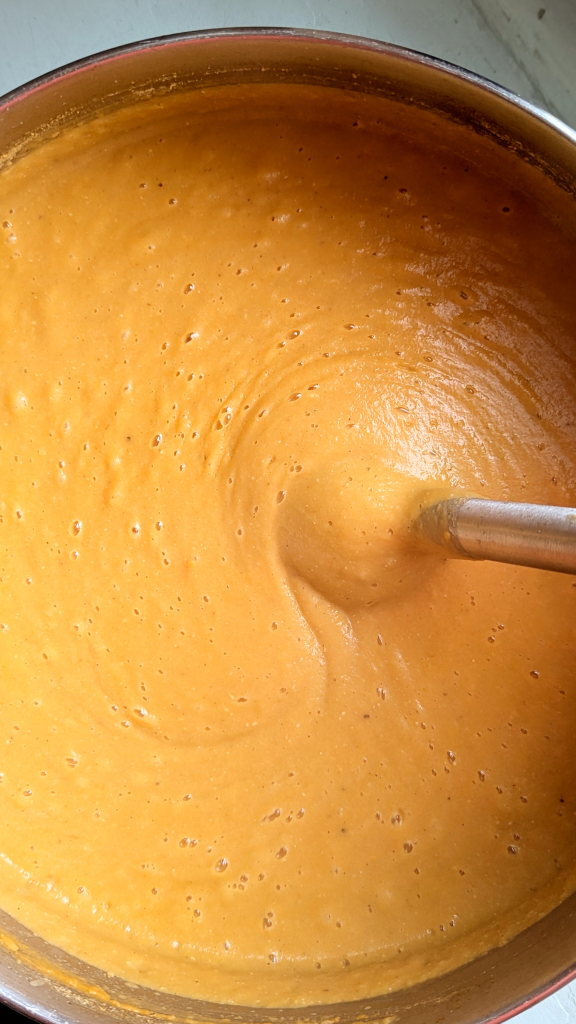 Blend Egyptian red lentil soup until smooth