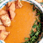 Egyptian red lentil soup with crispy pita