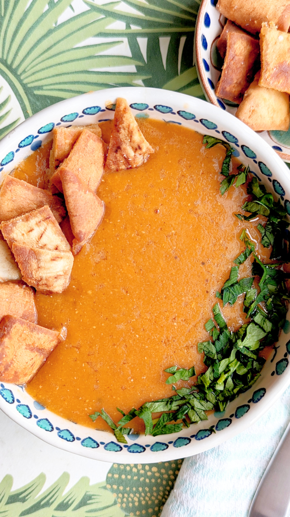 Egyptian red lentil soup with crispy pita