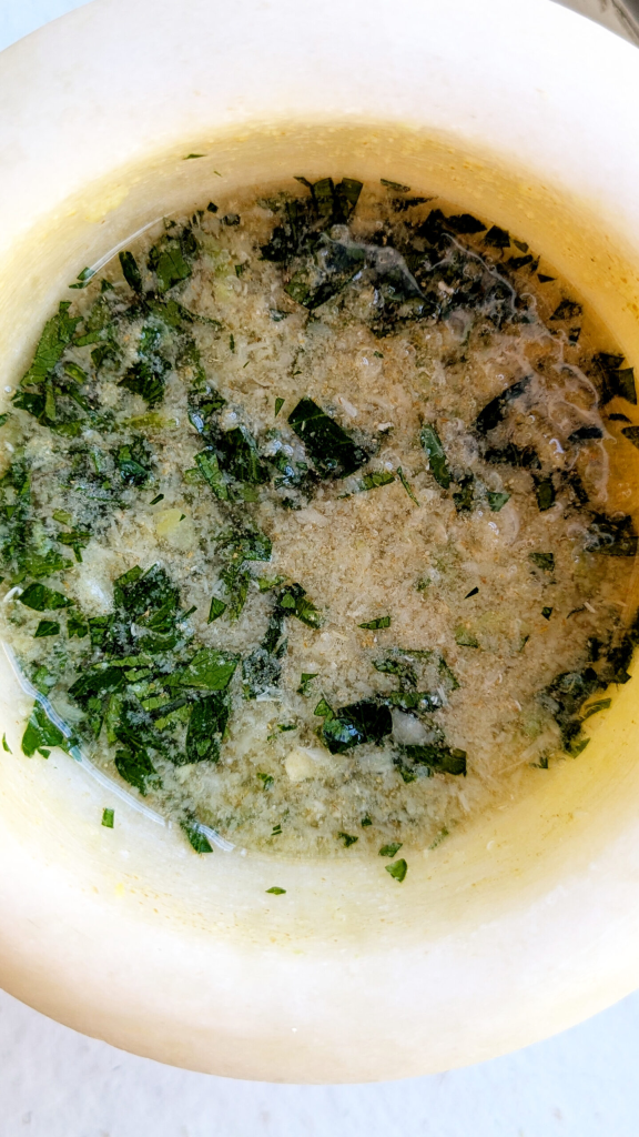 Add cumin, vinegar and parsley